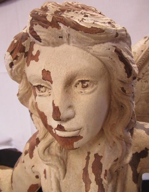 A PAIR OF PAINTED CARVED WOOD ANGELS Image