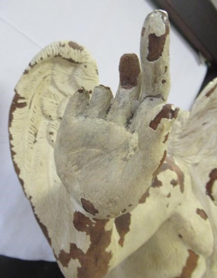 A PAIR OF PAINTED CARVED WOOD ANGELS Image