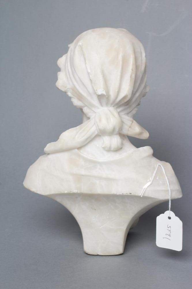 AN ALABASTER BUST OF A YOUNG WOMAN Image