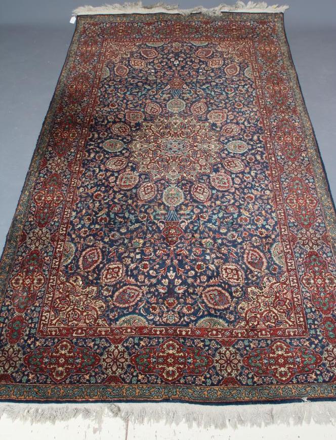 A PERSIAN RUG Image