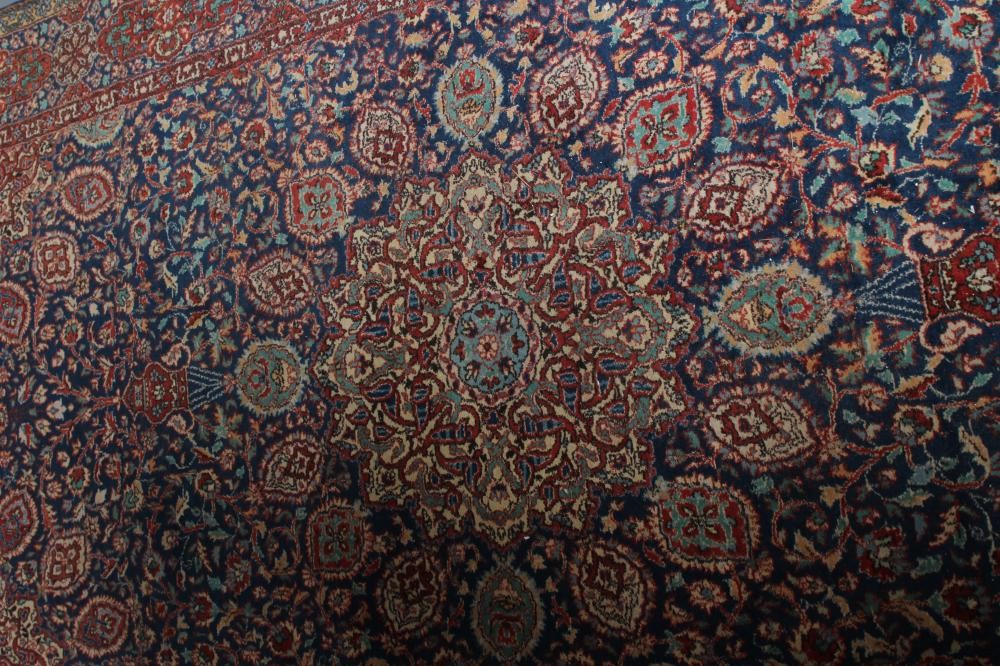 A PERSIAN RUG Image