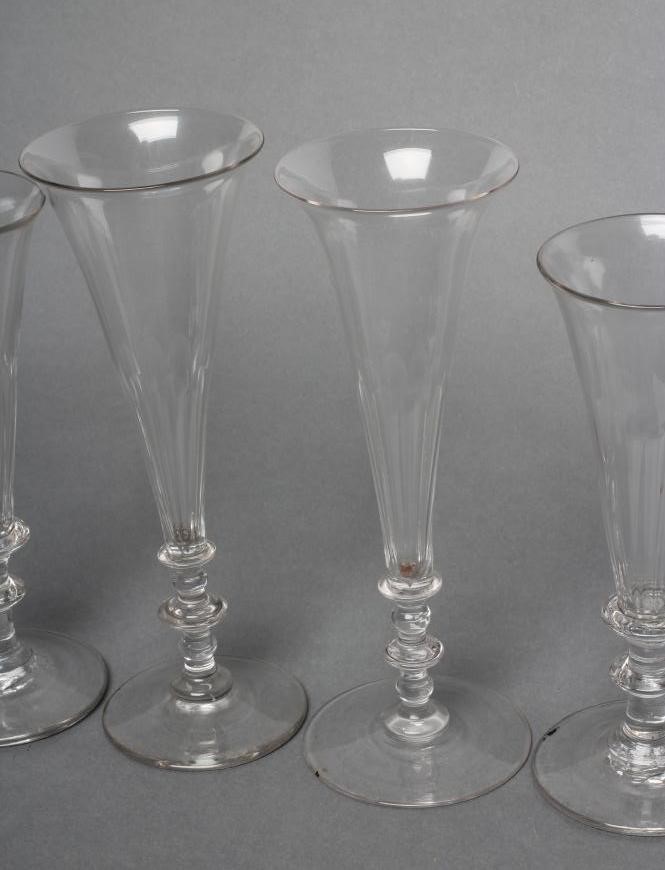 A COLLECTION OF EIGHT CHAMPAGNE FLUTES Image