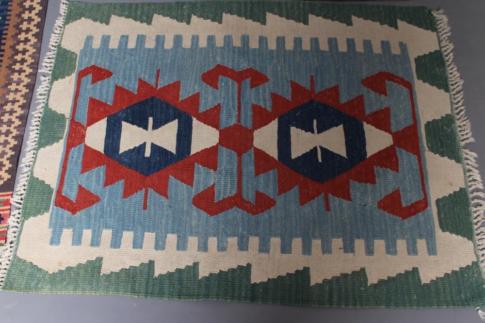 A FLAT WEAVE KILIM RUG Image