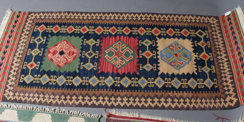 A FLAT WEAVE KILIM RUG Image