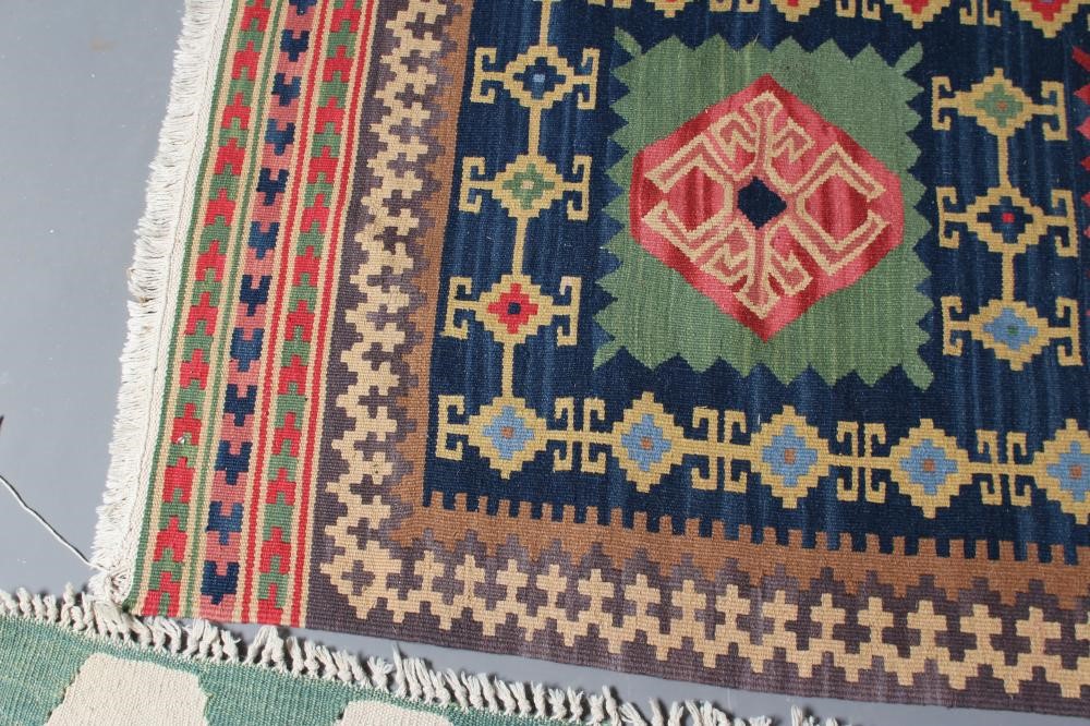 A FLAT WEAVE KILIM RUG Image