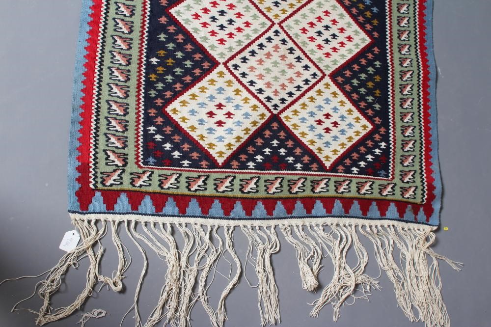 A FLAT WEAVE KILIM RUG Image
