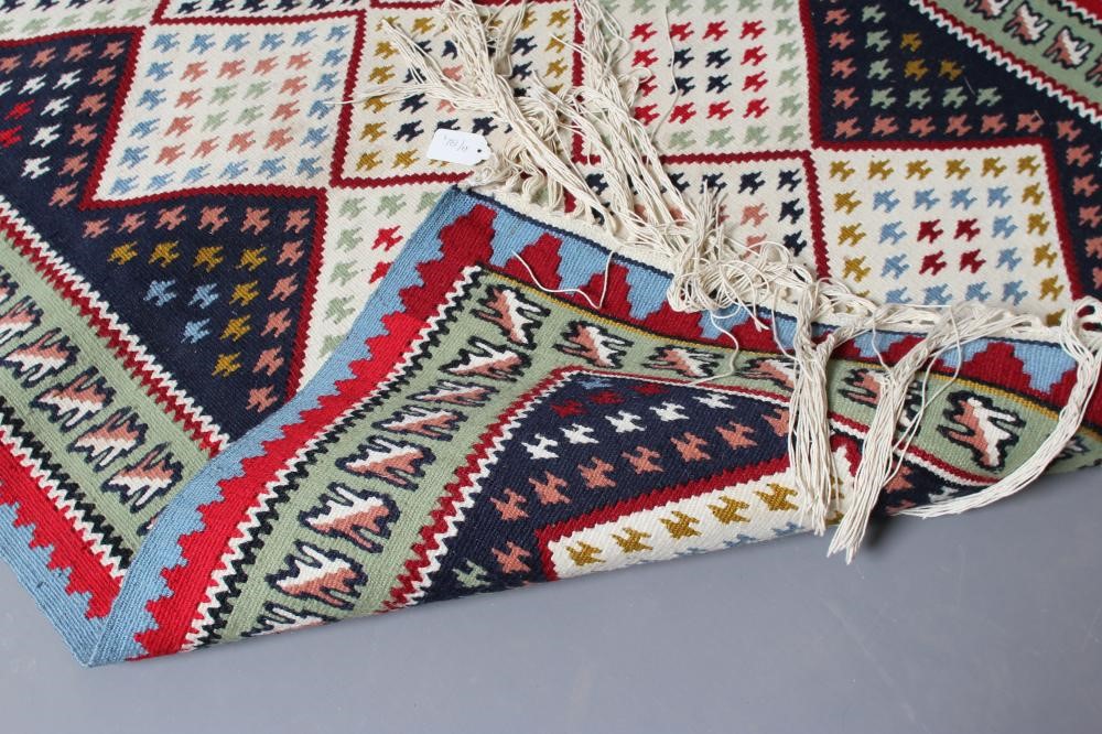 A FLAT WEAVE KILIM RUG Image