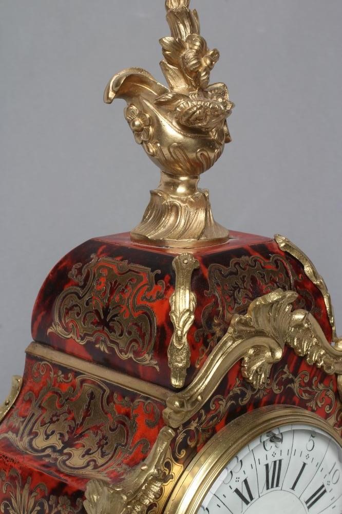 A LOUIS XV STYLE MANTEL CLOCK Image