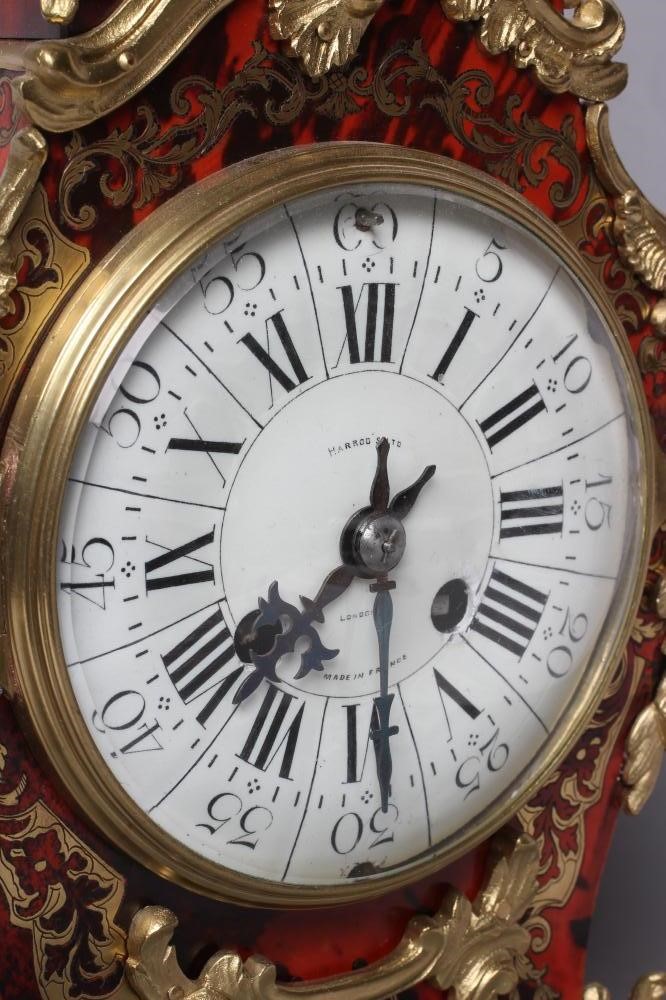 A LOUIS XV STYLE MANTEL CLOCK Image