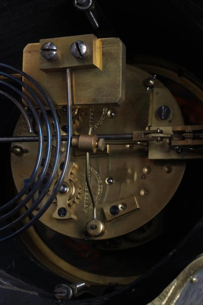 A LOUIS XV STYLE MANTEL CLOCK Image