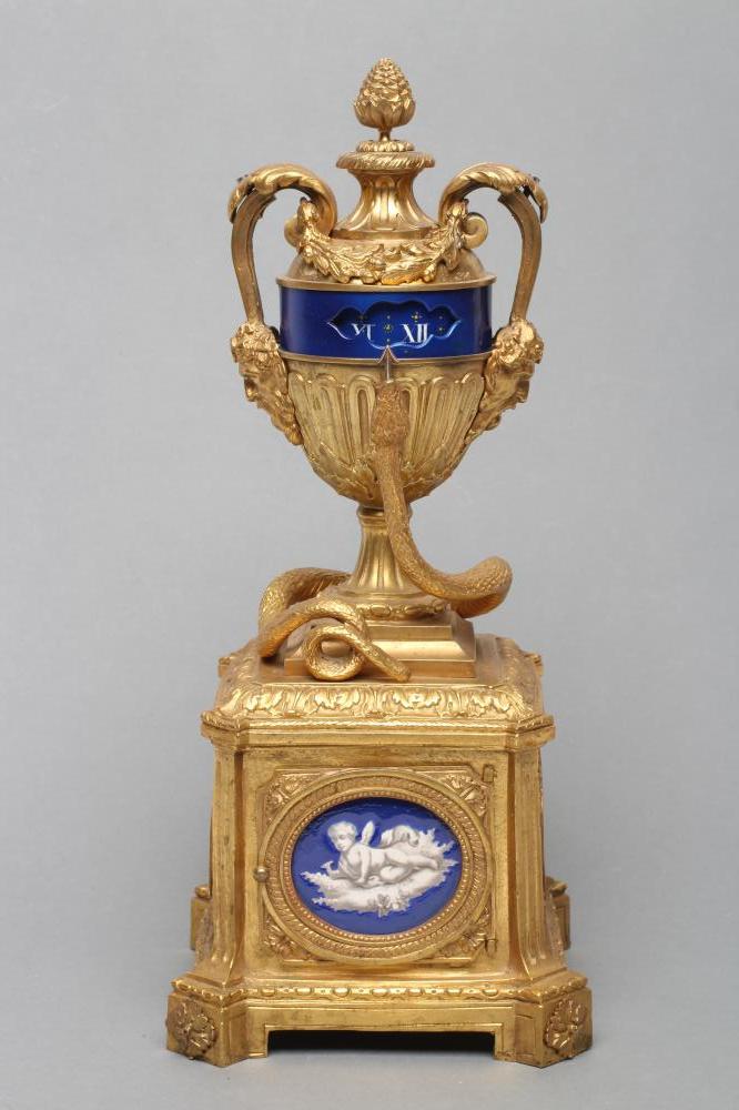 A FRENCH GILT METAL AND PORCELAIN LOUIS XVI STYLE URN CLOCK Image
