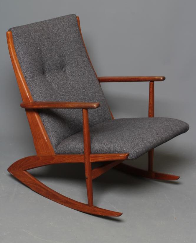 A TEAK ROCKING CHAIR Image