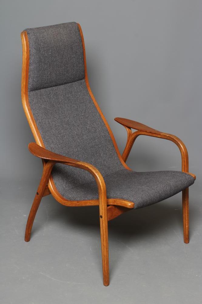 A LAMINO TEAK AND OAK CHAIR by Yngve Ekstrom Image