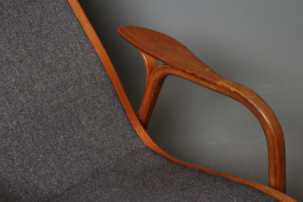 A LAMINO TEAK AND OAK CHAIR by Yngve Ekstrom Image