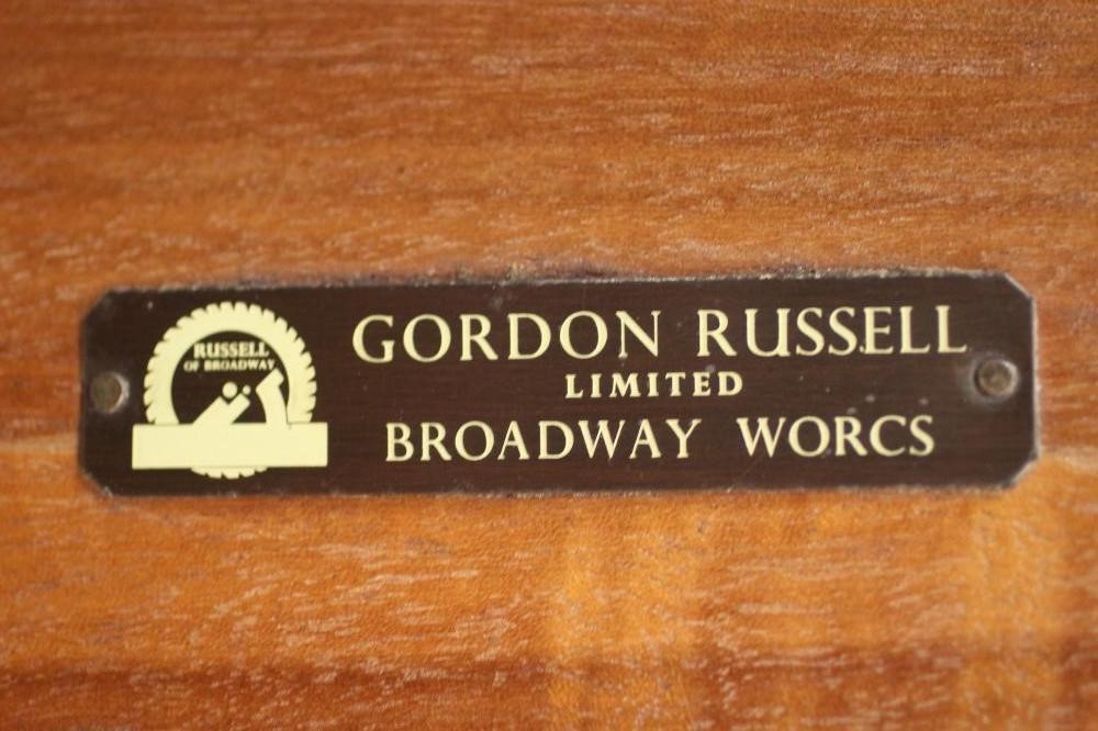 A GORDON RUSSELL OF BROADWAY TEAK DINING TABLE AND CHAIRS Image