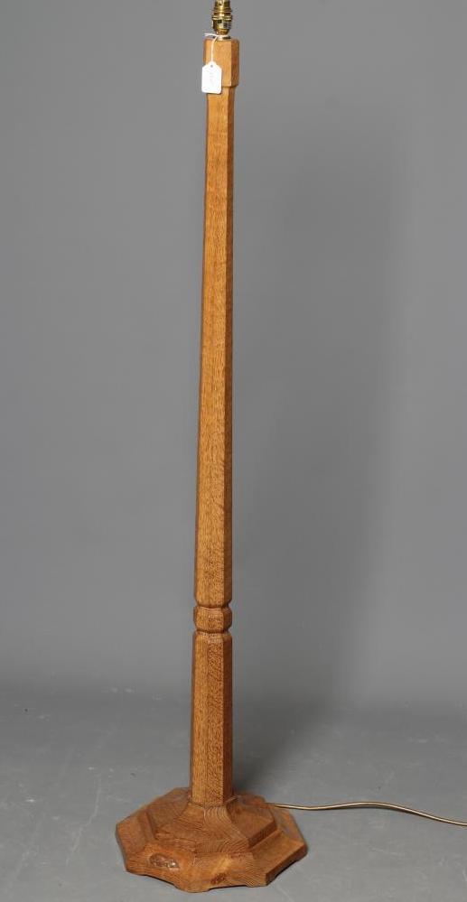 A ROBERT THOMPSON ADZED OAK STANDARD LAMP Image