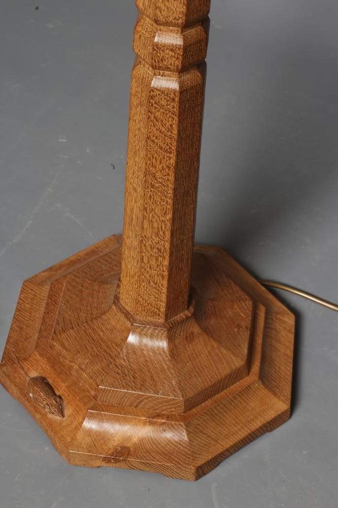 A ROBERT THOMPSON ADZED OAK STANDARD LAMP Image