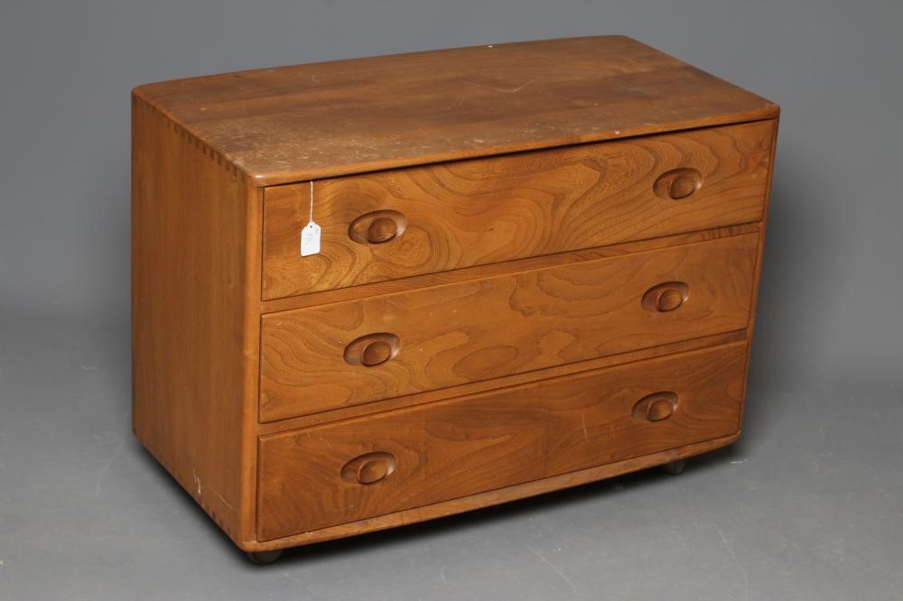 AN ERCOL ELM WINDSOR WARDROBE Image