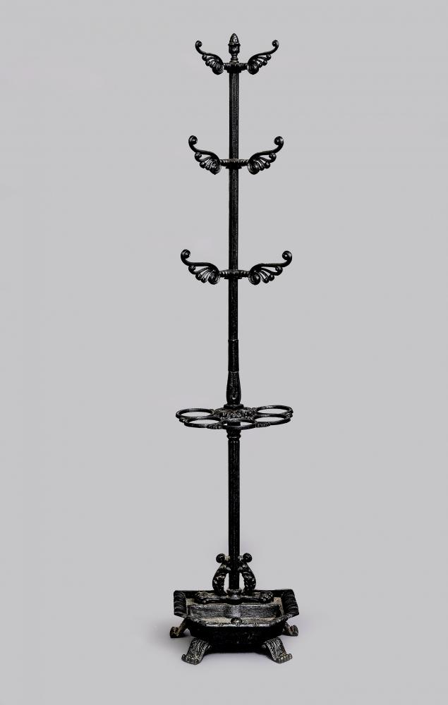 A REGENCY CAST IRON COAT AND STICK STAND Image