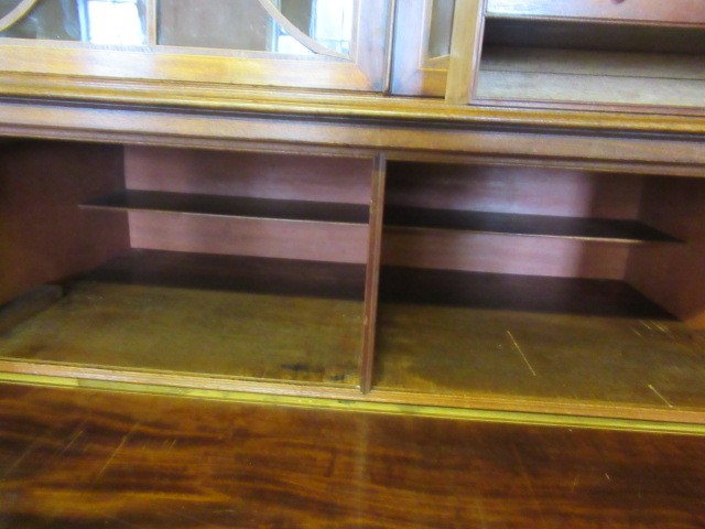 A GEORGIAN MAHOGANY SECRETAIRE BOOKCASE Image