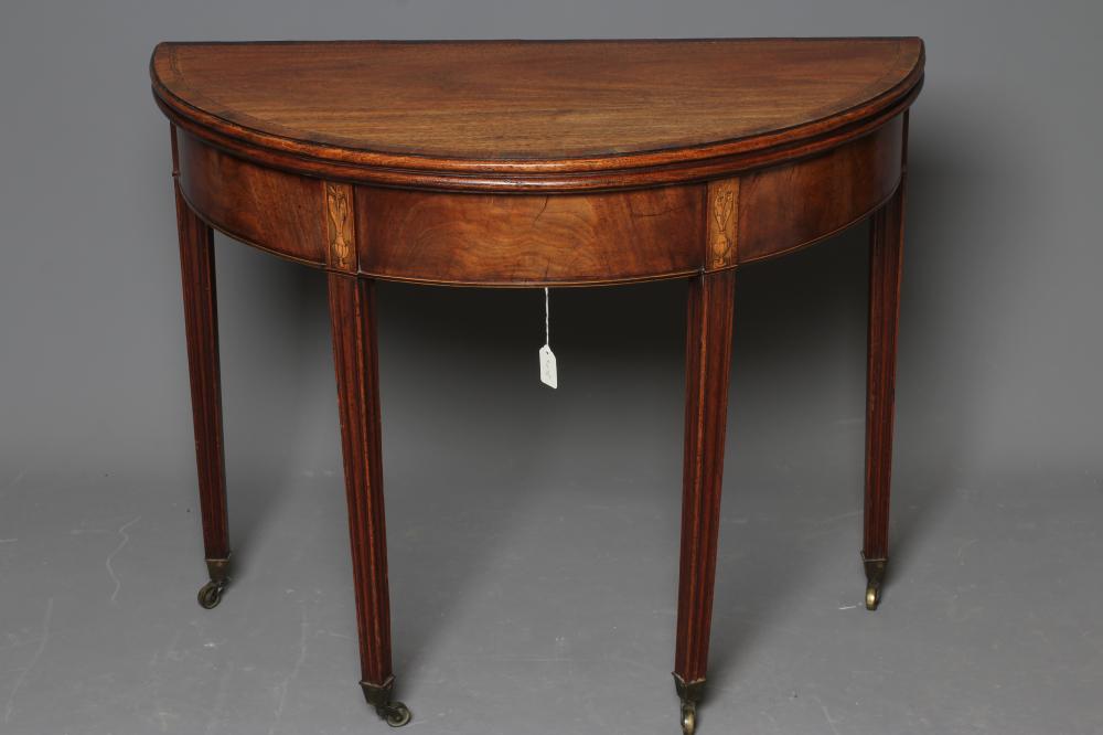 A GEORGIAN MAHOGANY FOLDING TEA TABLE Image