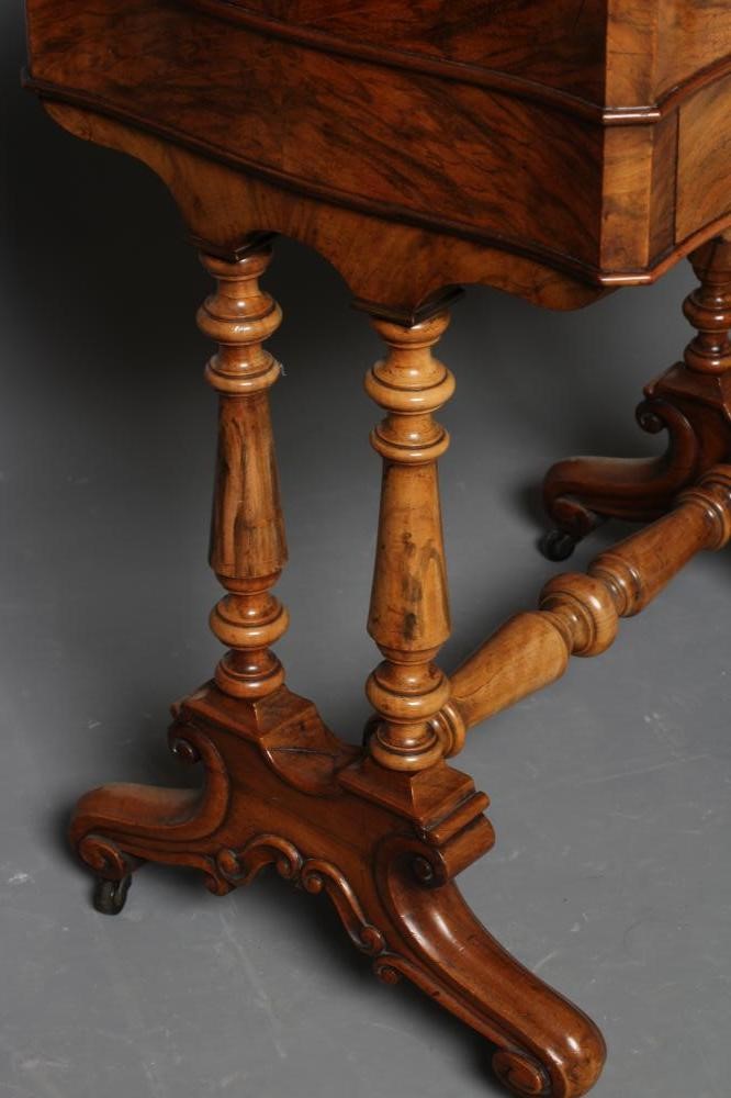 A VICTORIAN BURR WALNUT WORK TABLE of serpentine oblong form Image