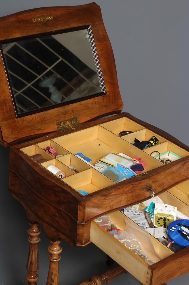 A VICTORIAN BURR WALNUT WORK TABLE of serpentine oblong form Image