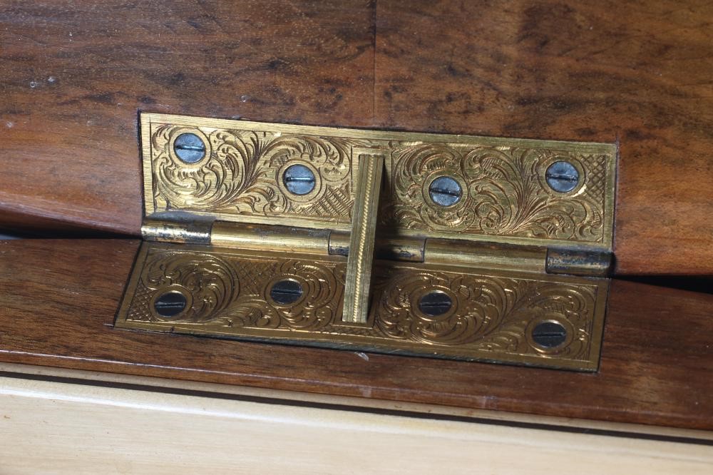 A VICTORIAN BURR WALNUT WORK TABLE of serpentine oblong form Image