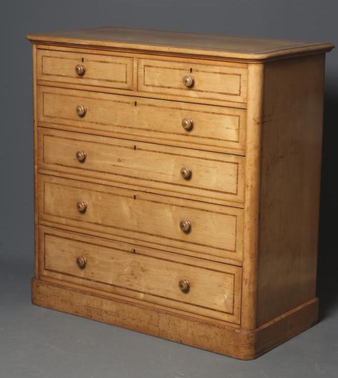A VICTORIAN SATIN BIRCH STRAIGHT FRONT CHEST of rounded oblong form with rosewood banding Image