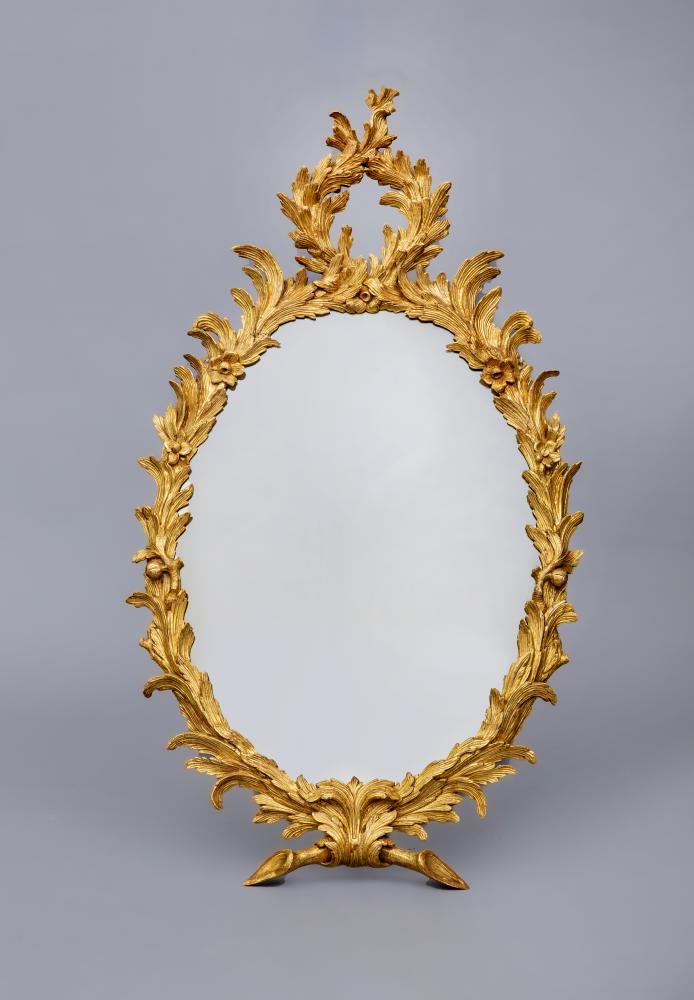 A CARVED AND GILT WOOD PIER GLASS Image