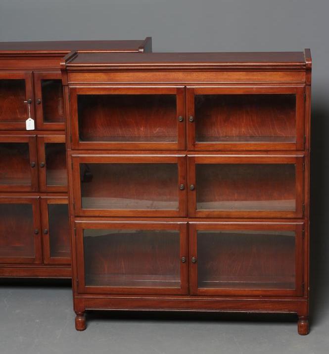 A PAIR OF MAHOGANY BOOKCASES Image
