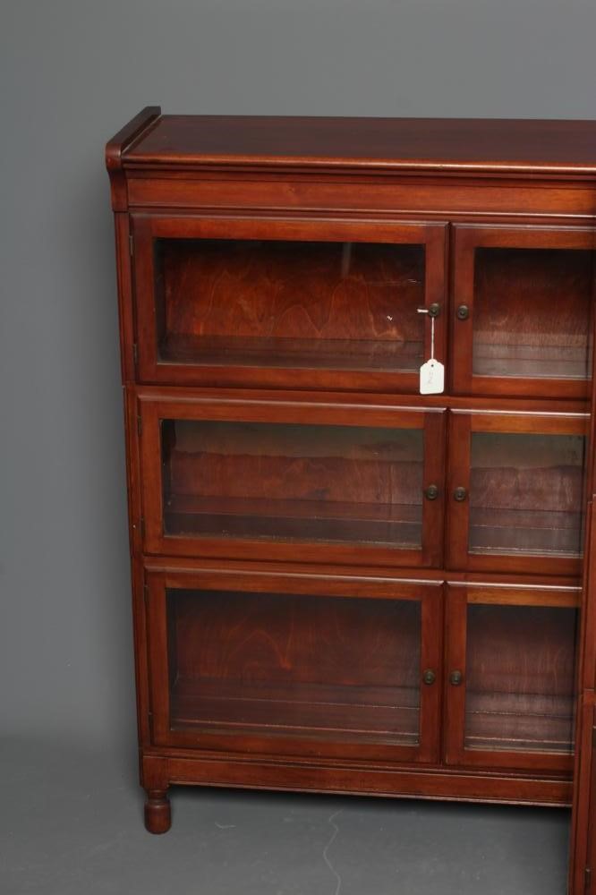A PAIR OF MAHOGANY BOOKCASES Image