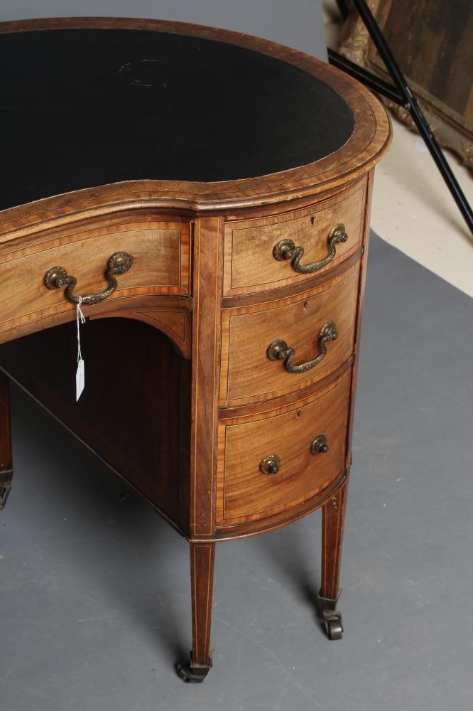 A LATE VICTORIAN DESK of kidney form Image