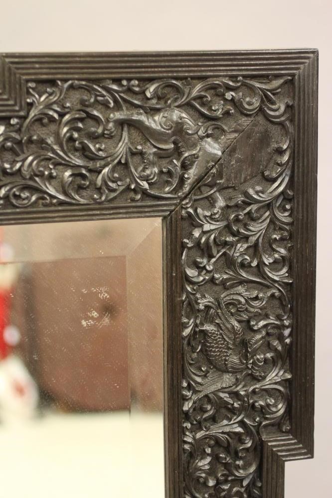 AN INDIAN CARVED EBONY(?) FRAME Image