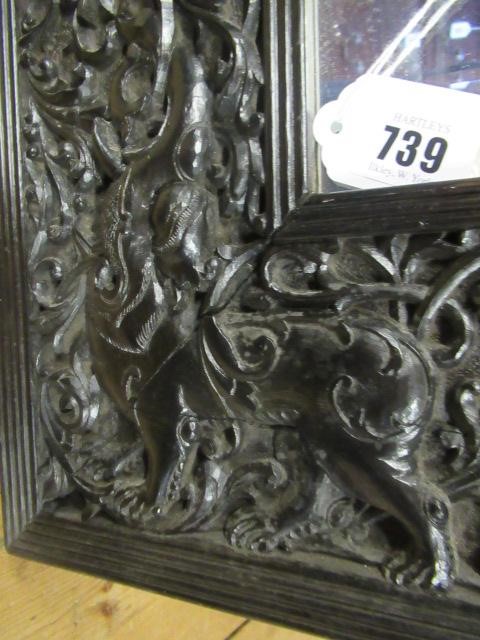 AN INDIAN CARVED EBONY(?) FRAME Image