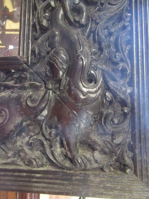 AN INDIAN CARVED EBONY(?) FRAME Image