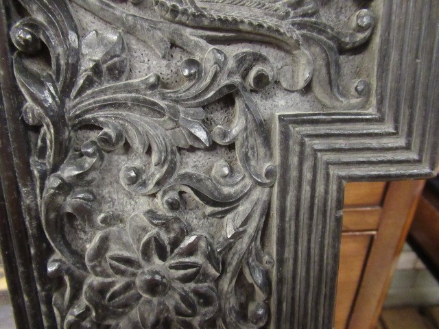 AN INDIAN CARVED EBONY(?) FRAME Image