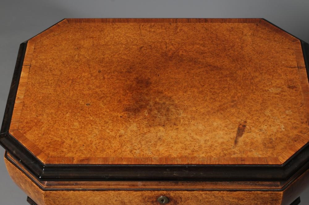 A FINE MAHOGANY AND BURR AMBOYNA TEAPOY Image