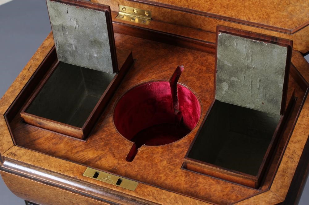 A FINE MAHOGANY AND BURR AMBOYNA TEAPOY Image