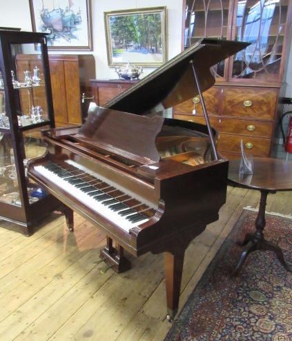 A MAHOGANY CASED BABY GRAND PIANO By John Broadwood & Sons Image