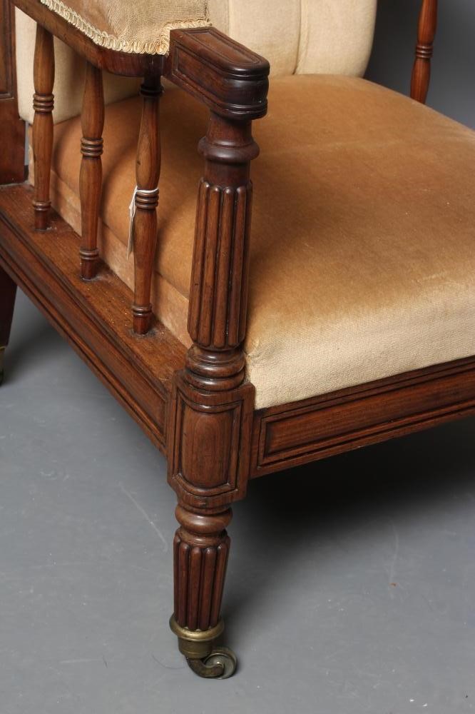 A GENTLEMAN'S GEORGE IV MAHOGANY SHOW FRAME ARMCHAIR button upholstered in champagne dralon Image