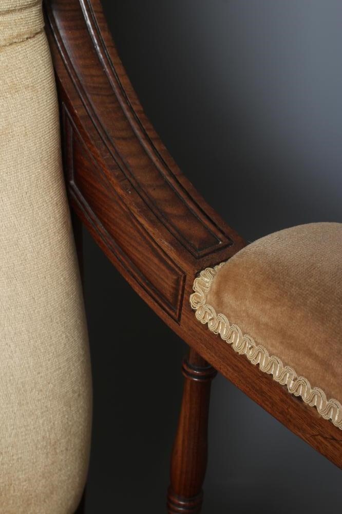 A GENTLEMAN'S GEORGE IV MAHOGANY SHOW FRAME ARMCHAIR button upholstered in champagne dralon Image