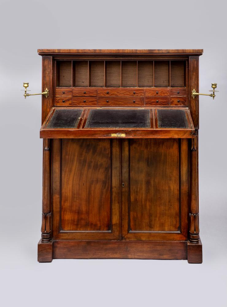 A REGENCY ROSEWOOD WRITING DESK of shallow oblong form Image