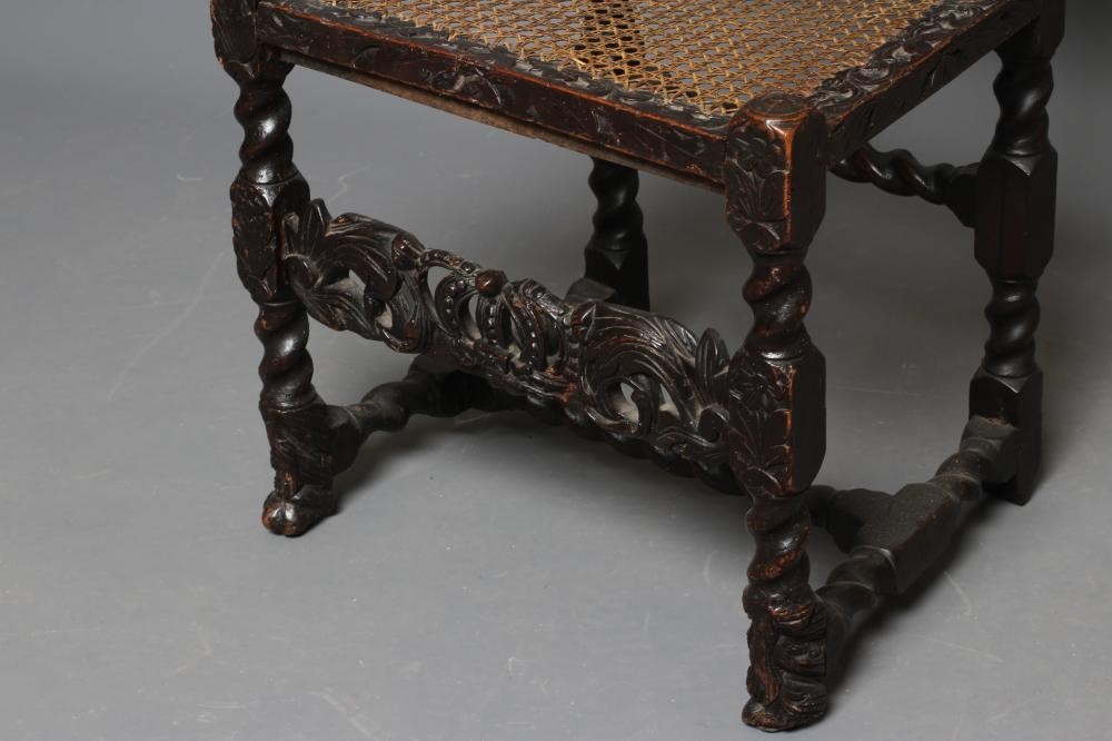 A CHARLES II CARVED WALNUT SIDE CHAIR Image