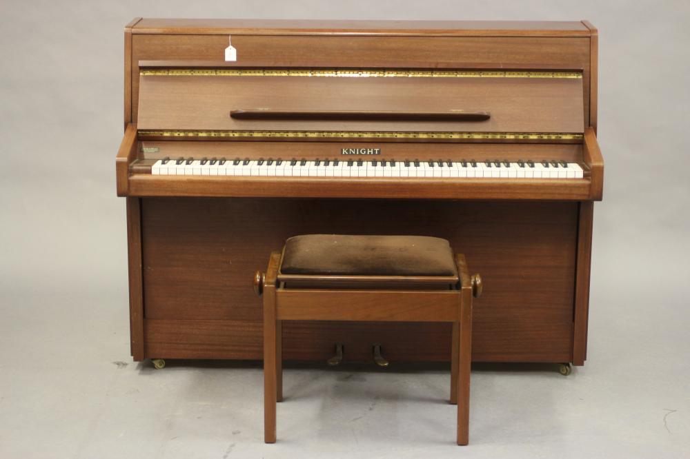A MODERN UPRIGHT PIANO by Knight in teak case Image