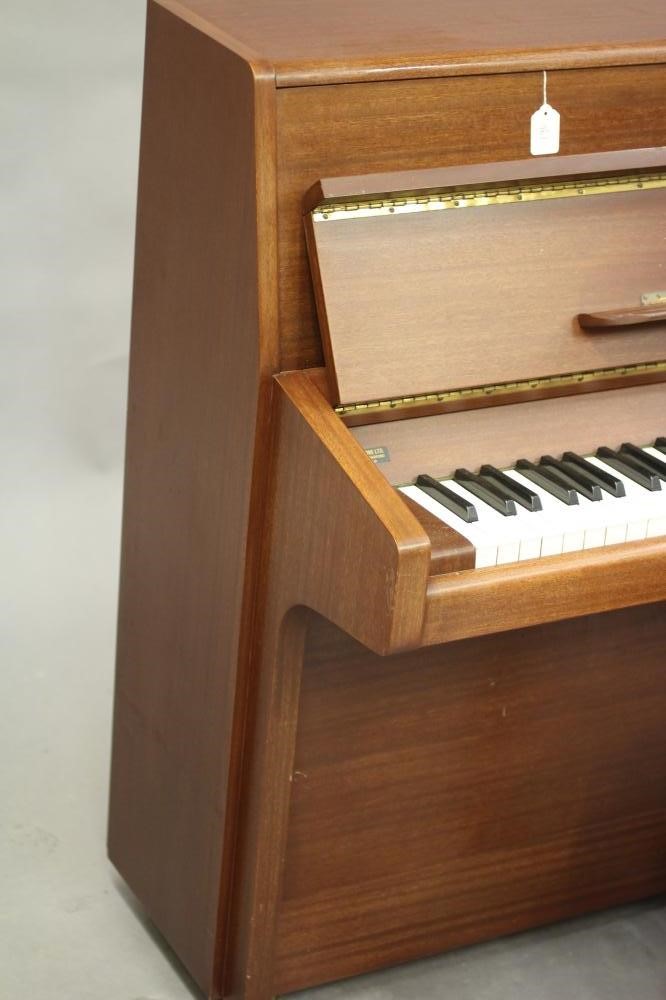 A MODERN UPRIGHT PIANO by Knight in teak case Image