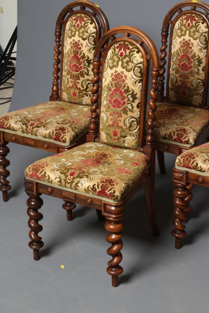 A SET OF FOUR VICTORIAN WALNUT SIDE CHAIRS Image