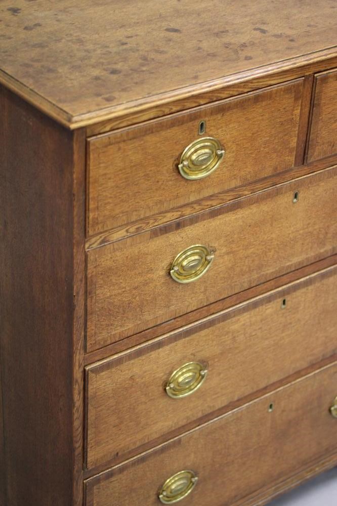 AN OAK AND MAHOGANY BANDED CHEST Image