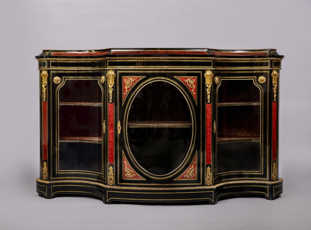 A VICTORIAN EBONISED AND RED TORTOISESHELL CREDENZA of bold serpentine outline with brass inlay and Image