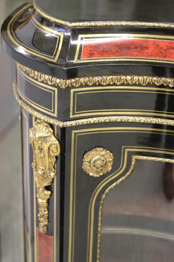 A VICTORIAN EBONISED AND RED TORTOISESHELL CREDENZA of bold serpentine outline with brass inlay and Image